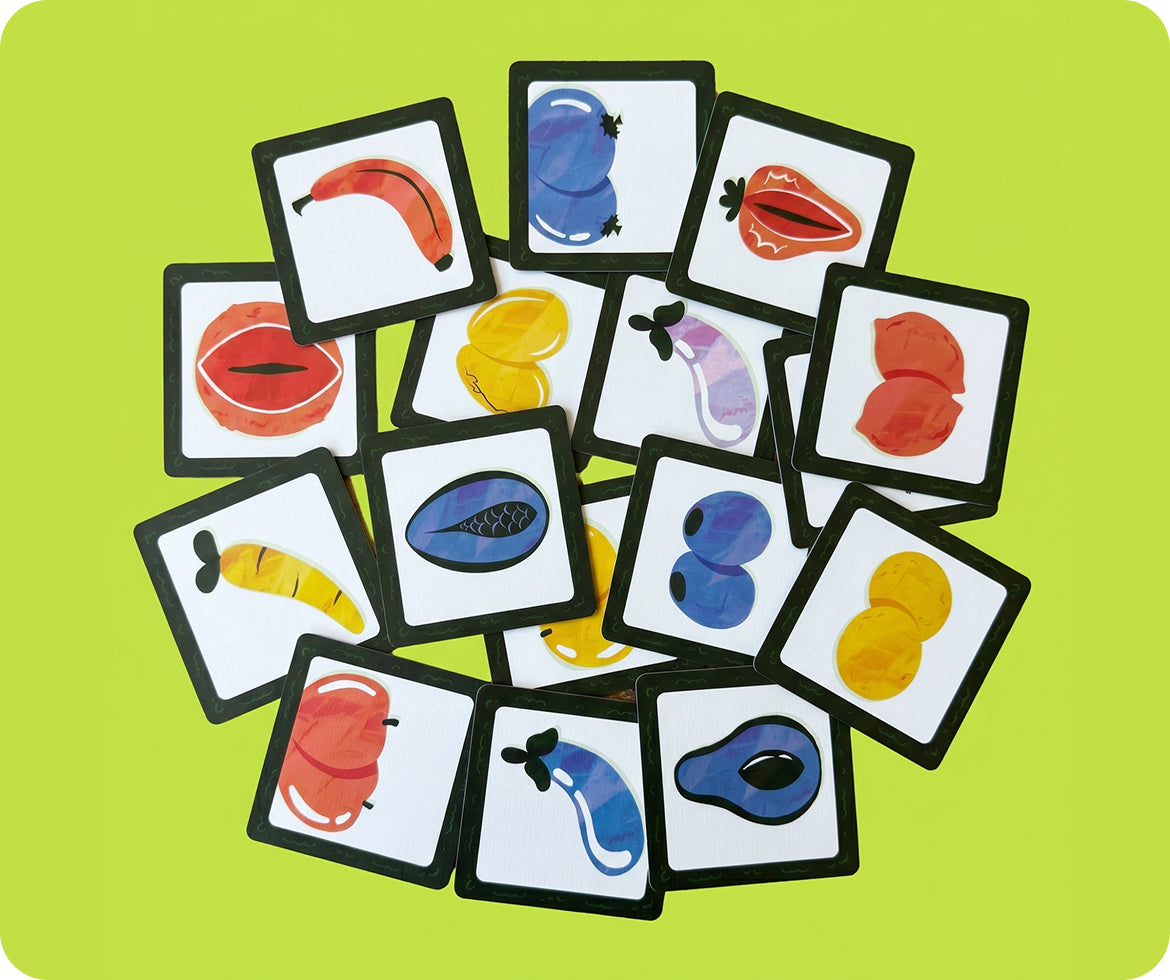 Various fruit and vegetable-themed cards from the Get The Pickle game